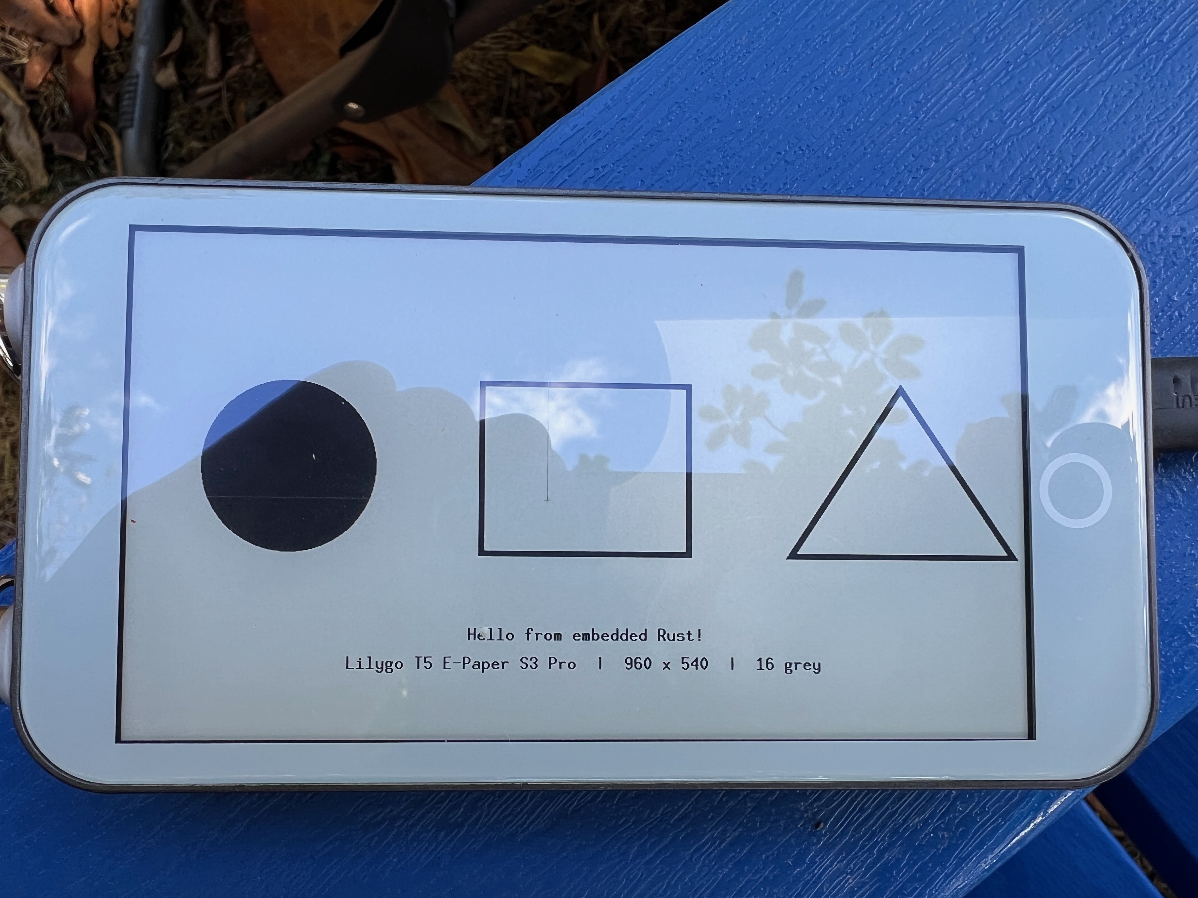e-reader device showing geometric shapes